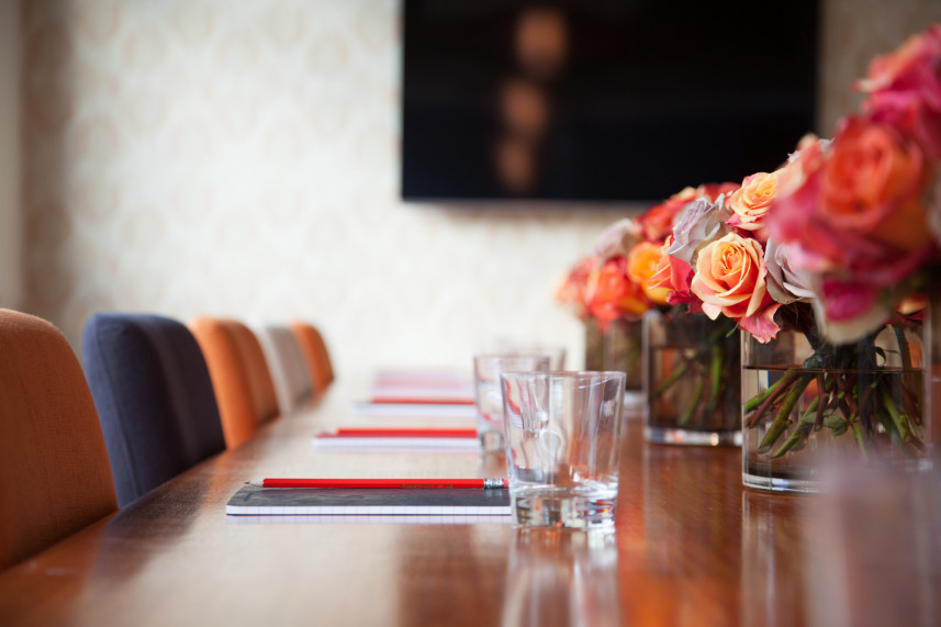 Petal to the metal event flowers with bowls of roses for a corporate event